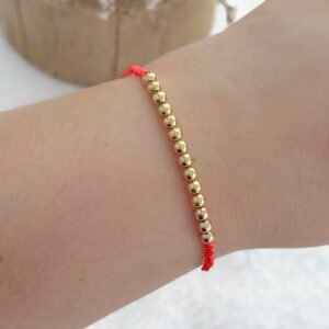 Pulsera Hilo Rojo Combinada Acero Dorado